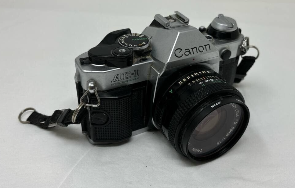 Canon AE-1 Film Camera 35mm Manual Focus SLR with 50mm 1:1.8 Lens Auto Exposure