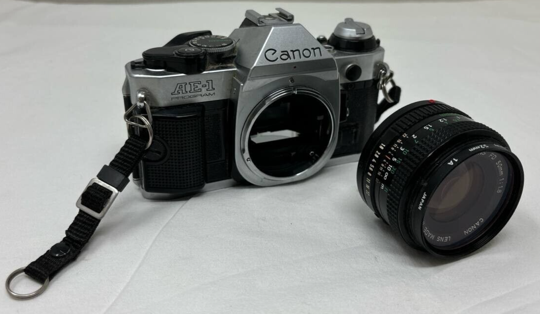 Canon AE-1 Film Camera 35mm Manual Focus SLR with 50mm 1:1.8 Lens Auto Exposure