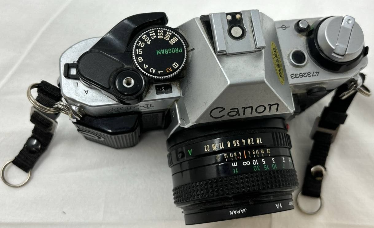 Canon AE-1 Film Camera 35mm Manual Focus SLR with 50mm 1:1.8 Lens Auto Exposure